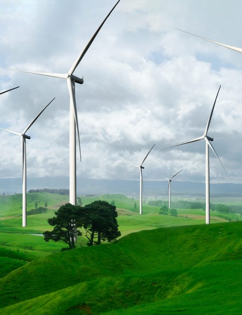 Wind turbine farm power generator in beautiful nature landscape for production of renewable energy.